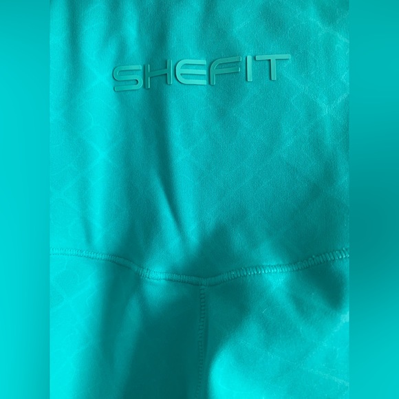 SHEFIT Fierce Boss Turquoise Teal High Rise Moisture
Wicking Leggings - Picture 4 of 7